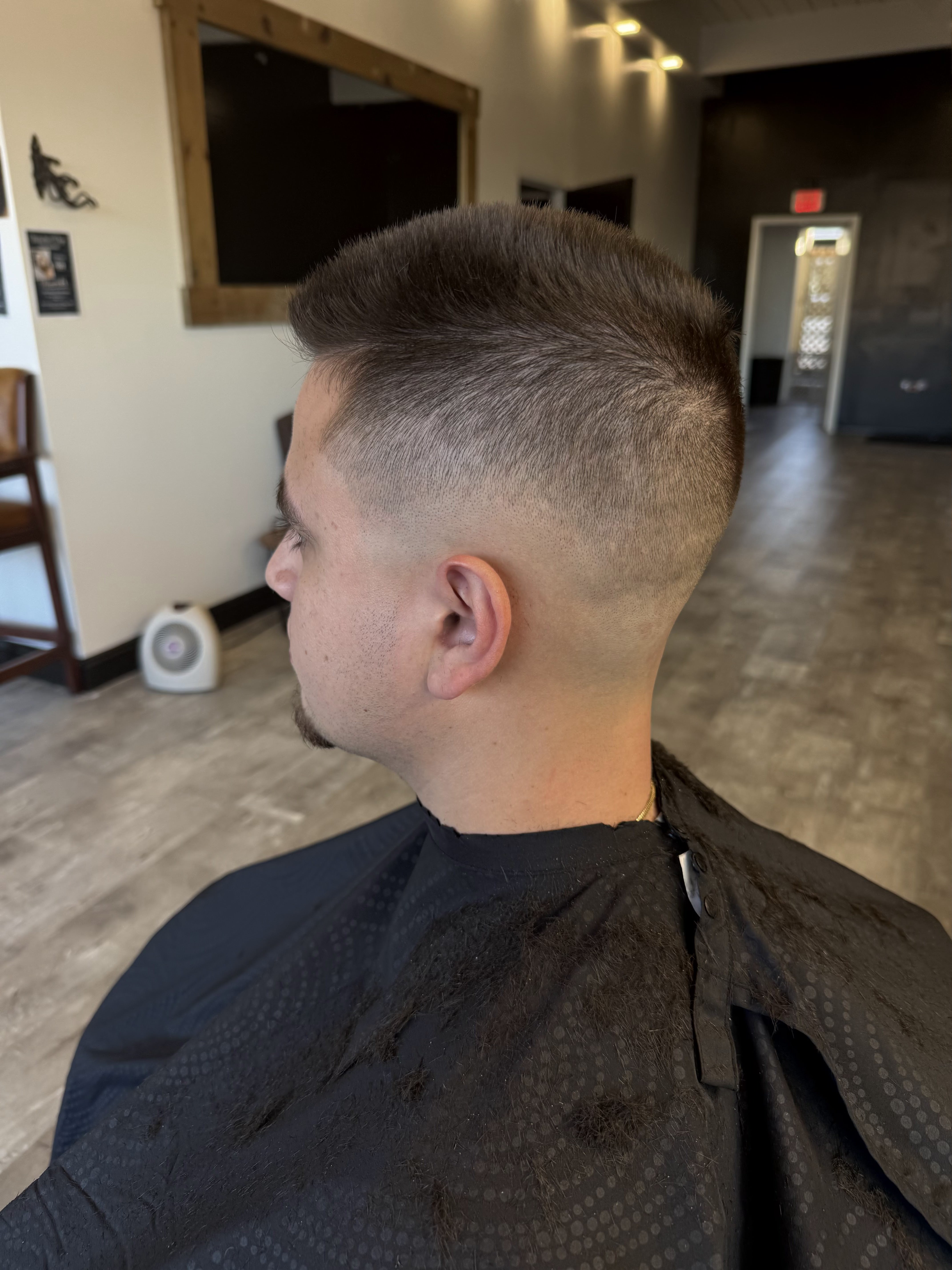 Haircut by Red's Barbering & Co.