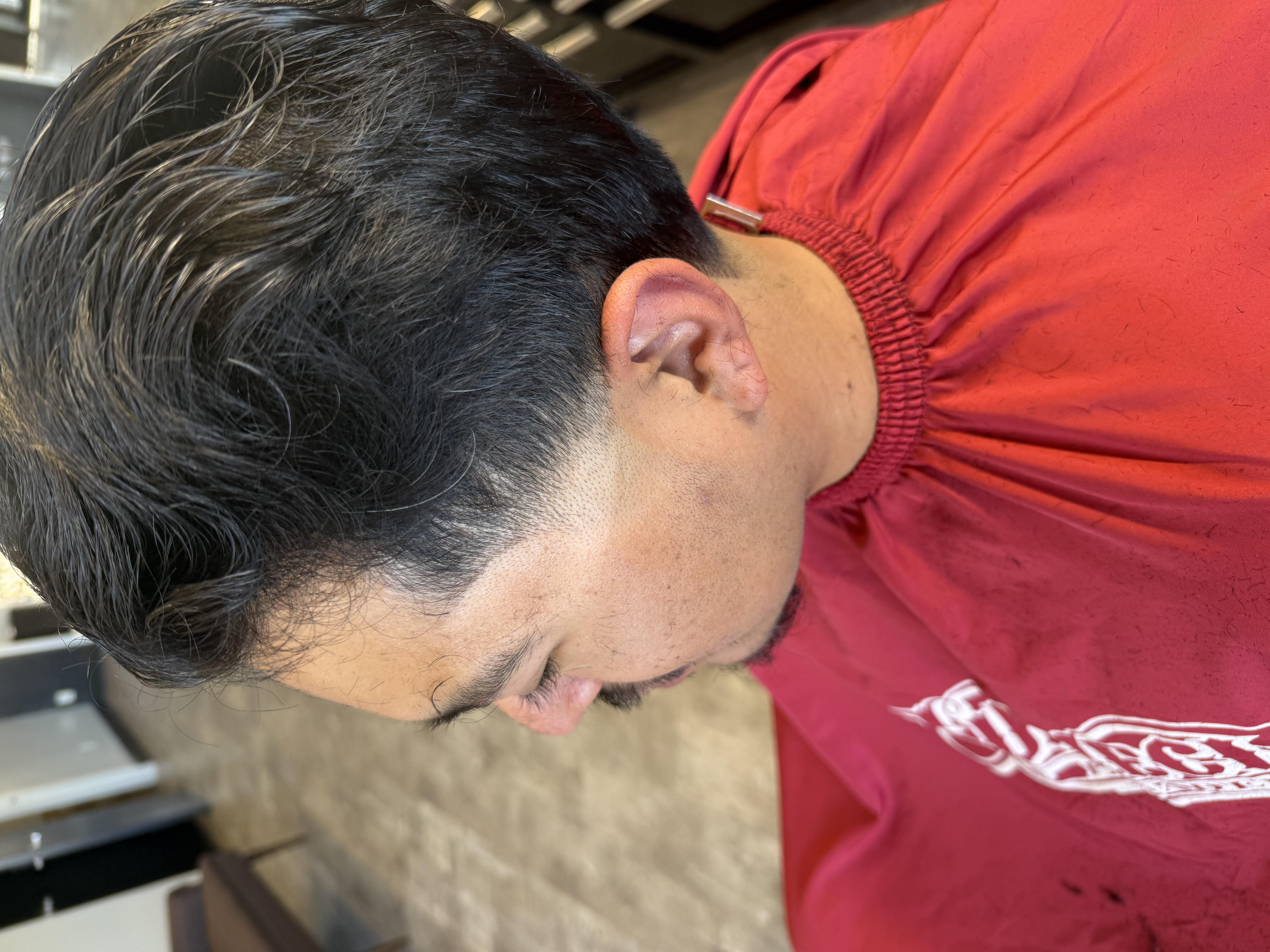 Haircut by Red's Barbering & Co.